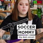 Sophia Regina Allison Instagram – #tinydesk • Sophie Allison and crew finally, after a three-year delay, make their Tiny Desk debut in a lovingly performed set. Click the link in bio to watch the full performance from Soccer Mommy (@soccermommyband)!
