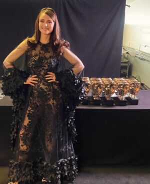 Sophie Ellis-Bextor Instagram - BAFTAs Baby!! 
Last night was amazing. What a special thing. So happy to have been asked to sing but as is always the case, there was a brilliant team effort behind the performance. Big thanks to @victoriajayneadcock for magnificent styling - I love that we created a story with the clothes. Thank you to my fantastically talented friend @lisalaudat1 for such beautiful glam. Lisa did my hair for the video for murder and we’ve worked together since Take Me Home. She’s so incredible and so lovely to pay tribute to @louiseconstad and the green glitter eye she created for murder all the way back in 2001. 
Thanks to my management Wallace and to @sarahadamssassy and Thom 

I loved my dresses - see from the photos you can hide a child inside that skirt! 
I loved the dancing @_paul_roberts and the dancers created 
I loved changing into 4 different outfits - cmon you gotta go hard or home for @bafta 
And I loved toasting the adventure of Murder with such a special stage 
Mainly though I loved doing it all with @richardjonesface by my side, who has always supported me in all that I do. We even had a bit of time on the dancefloor last night - first time in a while! 

Glam @lancomeofficial @ghdhair 
Red carpet dress @antoniorivamilano
@antonioriva_official
@rogervivier @swarovski
Performance @sophiecouture
@miumiu @swarovski @katherinejamesjewellery
Dinner @mrselfportrait @louboutinworld @luluguinness
 @swarovski @katherinejamesjewellery
Party @fumbalinas - kaftan of dreams!!! Green and twinkly and perfect for dancing xxx