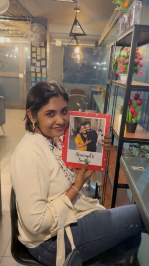 Sruthi Shanmuga Priya Instagram - @sugarygifts  Such a lovely and memorable gift to cherish. A photo book which I can carry handy wherever I go. It looks so beautiful with a bunch of our favourite beautiful memories from Paris and Spain. The little gifts that remind every beautiful memory in my day to day life. The keychain, the stand, the photo book and everything, I find it so special. Thank you so much @sugarygifts for such creative cute gifts. You’re playing a big role in connecting with his memories ❤️ thanks a lot 

~ARAVIND’s SRUTHI forever ♾️

#sugarygifts #photobook #cutegifts #memories #happiness