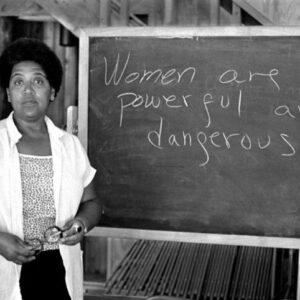 Stacey Plaskett Instagram - Here’s the second clue of today: 

▪️ A self-described “black, lesbian, mother, warrior, poet” who dedicated both her life and her creative talent to confronting and addressing injustices of racism, sexism, classism, and homophobia.

Can you guess who this person is?

Photo Credit: Robert Alexander/Getty Images
