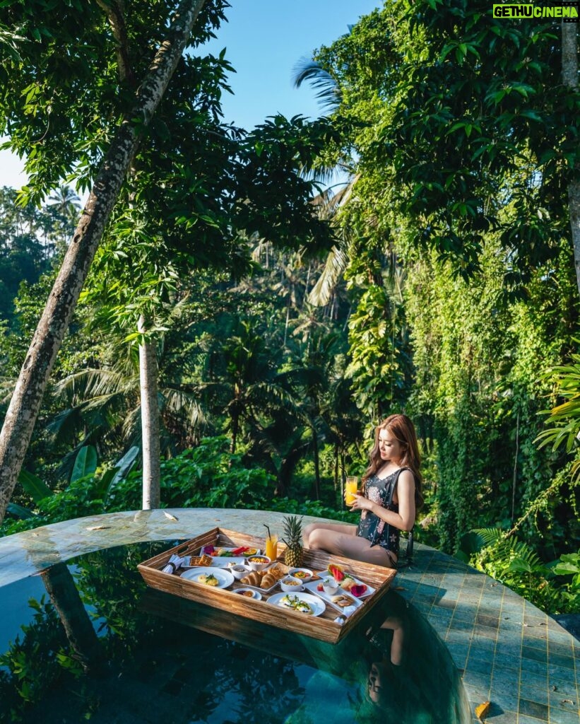 Stella Lee Instagram - Taking out my camera to capture the beauty of this resort @kamandalu 1. Resort from the top 2. Floating breakfast 3. My Balinese style bedroom 4 & 5. Picnic Paddy Lunch 6. Spa in the forest 7. Romantic candle light dinner in the garden 8. Breakfast time 9. Boat at the fish pond 10. My one bedroom pool villa from the top Which picture is your favorite? Yes I took the drone pic by myself 😜