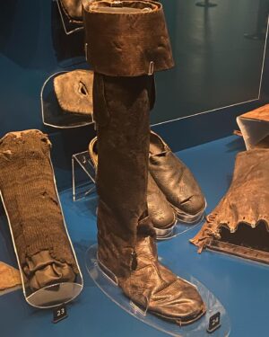 Suzannah Lipscomb Instagram - I find the @maryrosemuseum endlessly moving. Here is the ship on which Henry VIII and Charles V walked and on which, on 19 July 1545, 500 men lost their lives.

Their belongings - preserved in the silt of the seabed and recovered in an extraordinary piece of maritime archaeology in the late 1970s and early 1980s - give us an unparalleled insight into everyday Tudor life.

Of the 19,000 objects on board, here are just some of my favourites:
 - gold coins 
- this leather pouch, embossed with IHS (the first letters of the name of Jesus in Greek) and a cross, which held a sundial and wooden gavel
- this stylish leather boot
- a jerkin dyed with red madder
- these beautifully-tooled book covers with Latin inscriptions and gold clasps