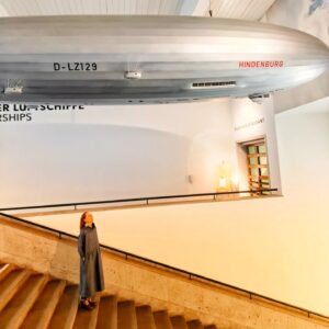 Suzanne Bernert Instagram - Let's take that car ! And a Zeppelin 😳🤪
2 museums in one day (check prior post!)
See all pics to see the model of a #zeppelin floating over me ! 
Stylish @thehaimishliving #thehaimishliving 
Can look and feel good #museums
.
.
.
#japaneseinspired #museumlover #zeppelin #zeppelinmuseum #friedrichshafen #madeinbharat #suzannebernert #arjunhardas #zeppelinmodel #allgäu #deutschlanderleben #traveldiaries_around