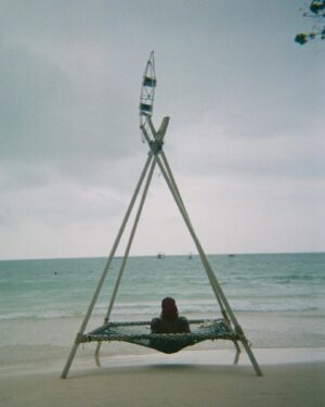 Sydney Chandler Instagram - catch an old speedboat. catch an island rainstorm. catch an ocean sunrise. catch a few rolls of film.