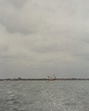 Sydney Chandler Instagram - catch an old speedboat. catch an island rainstorm. catch an ocean sunrise. catch a few rolls of film.