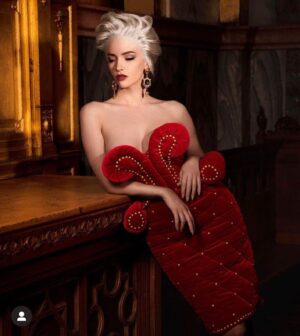 Talulah Riley Instagram - ❤️ I *LOVED* this shoot. @jeremyscott is a 🧠 genius 🧠 The clothes are fun, dramatic, romantic, fabulous ❤️

💋Wearing @moschino in @amazingmagazine 💋

🕰 I am variously a grandfather clock, silver-service, front door, portrait etc. What FUN! 🕰 

Thank you to the whole creative team for a lovely day, and for the chance to wear such incredible things. 

Photographer: @damianfoxe 
Styling: @mrbitton 
Hair: @thebradylea 
Make-up: @lisahoughton 
Nails: @robbietomkins 

xx