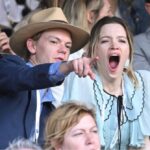 Talulah Riley Instagram - 🎾Have been in giggles for days at these candid shots from @wimbledon 🎾 🍾We posed very demurely at the @champagnelanson sign — Thank you, Lanson, for having us! And for feeding us all day long (lamb wellington, strawberries-and-cream, afternoon tea, pick-and-mix to take to court, lots of Lanson for Thomas. Yum.) But didn’t quite realise how visible we were (all day long…) while watching the tennis. 🍾 I usually describe myself as ‘stoic,’ but having seen these images I’m quite sure I can no longer make that claim… In a previous era, these might also be titled: ‘Why not to take your girlfriend to a sporting event.’ I honestly don’t know why I’m yawning/appear to be asleep in a lot of these shots. I was genuinely riveted by the matches. And thank you again, @champagnelanson for having us and for your very generous hospitality. 🖤🧷It was also lovely to have a mini @pistol reunion with @emmajappleton🧷🖤 💙And thank you @mrselfportrait for the loan of such a pretty dress. I really loved it. 💙 ✨Finals today. Unfortunately I’m not at Wimbledon, but will be cheering for @djokernole ✨ photo credit: @gettyimages