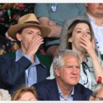 Talulah Riley Instagram - 🎾Have been in giggles for days at these candid shots from @wimbledon 🎾 🍾We posed very demurely at the @champagnelanson sign — Thank you, Lanson, for having us! And for feeding us all day long (lamb wellington, strawberries-and-cream, afternoon tea, pick-and-mix to take to court, lots of Lanson for Thomas. Yum.) But didn’t quite realise how visible we were (all day long…) while watching the tennis. 🍾 I usually describe myself as ‘stoic,’ but having seen these images I’m quite sure I can no longer make that claim… In a previous era, these might also be titled: ‘Why not to take your girlfriend to a sporting event.’ I honestly don’t know why I’m yawning/appear to be asleep in a lot of these shots. I was genuinely riveted by the matches. And thank you again, @champagnelanson for having us and for your very generous hospitality. 🖤🧷It was also lovely to have a mini @pistol reunion with @emmajappleton🧷🖤 💙And thank you @mrselfportrait for the loan of such a pretty dress. I really loved it. 💙 ✨Finals today. Unfortunately I’m not at Wimbledon, but will be cheering for @djokernole ✨ photo credit: @gettyimages