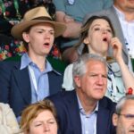 Talulah Riley Instagram - 🎾Have been in giggles for days at these candid shots from @wimbledon 🎾 🍾We posed very demurely at the @champagnelanson sign — Thank you, Lanson, for having us! And for feeding us all day long (lamb wellington, strawberries-and-cream, afternoon tea, pick-and-mix to take to court, lots of Lanson for Thomas. Yum.) But didn’t quite realise how visible we were (all day long…) while watching the tennis. 🍾 I usually describe myself as ‘stoic,’ but having seen these images I’m quite sure I can no longer make that claim… In a previous era, these might also be titled: ‘Why not to take your girlfriend to a sporting event.’ I honestly don’t know why I’m yawning/appear to be asleep in a lot of these shots. I was genuinely riveted by the matches. And thank you again, @champagnelanson for having us and for your very generous hospitality. 🖤🧷It was also lovely to have a mini @pistol reunion with @emmajappleton🧷🖤 💙And thank you @mrselfportrait for the loan of such a pretty dress. I really loved it. 💙 ✨Finals today. Unfortunately I’m not at Wimbledon, but will be cheering for @djokernole ✨ photo credit: @gettyimages