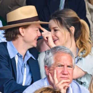 Talulah Riley Instagram - 🎾Have been in giggles for days at these candid shots from @wimbledon 🎾

🍾We posed very demurely at the @champagnelanson sign — Thank you, Lanson, for having us! And for feeding us all day long (lamb wellington, strawberries-and-cream, afternoon tea, pick-and-mix to take to court, lots of Lanson for Thomas. Yum.) But didn’t quite realise how visible we were (all day long…) while watching the tennis. 🍾

I usually describe myself as ‘stoic,’ but having seen these images I’m quite sure I can no longer make that claim… 

In a previous era, these might also be titled: ‘Why not to take your girlfriend to a sporting event.’ I honestly don’t know why I’m yawning/appear to be asleep in a lot of these shots. I was genuinely riveted by the matches. And thank you again, @champagnelanson for having us and for your very generous hospitality. 

🖤🧷It was also lovely to have a mini @pistol reunion with @emmajappleton🧷🖤

💙And thank you @mrselfportrait for the loan of such a pretty dress. I really loved it. 💙 

✨Finals today. Unfortunately I’m not at Wimbledon, but will be cheering for @djokernole ✨

photo credit: @gettyimages