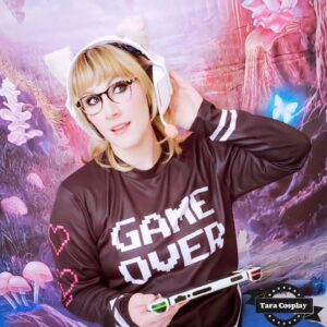 Tara-Nicole Azarian Instagram - Shall we play a game???? 🕹 In this ADORABLE 👕 by @pinkcity.ca
●●●
➡️ THE HIGHLIGHTS ⬅️
♿ hEDS
♿ MCAS
♿ POTS
♿ FIBRO
♿ DDD
♿ Hashimoto's 
♿ Scoliosis 
♿ Ambulatory Wheelchair User 
●●●●
☆ I am a disabled artist and pledges to my membership platforms allow me to help pay for the treatment I need. Be my hero and join today! ☆
●●●●
Photo: The Photo Owl 📷
Shirt: @pinkcity.ca 👕
●●●●
🎭 @taracosplay
✈️ @magickaltravel
🔮 @magickalstuffbytara
🔐 @maxx_warner
●●●●
#pinkcity #pinkcitygram #cosplayer #cosplayphotography #ambulatorywheelchairuser 
#gamergirl #streamer #EDSWarrior #dysautonomia 
#videogames #mastcellactivationsyndrome  #disabledandcute #officialtaracosplay #taranicoleazarian  #dynamicdisability #bodypositive #perfectlyimperfect
■■■■■■■■■