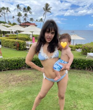 Tasie Lawrence Instagram - My husband just said something rude. Also who’s baby is this? Anyone missing a baby with a yellow heart face let me know