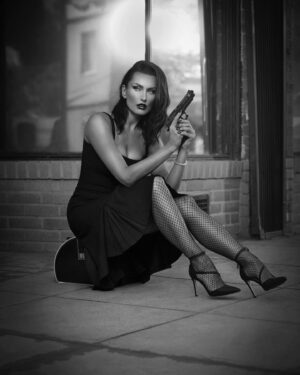 Tatiana Neva Instagram - Her gun is loaded… and so is her mind… and her heart is the source of  the spark that makes it all go boom ! 

Another beautiful #filmnoir photo from my recent Photoshoot with @unimaxstudio ! Love them!

#tatiananeva #model #actress #actionactress #fashionmodel