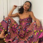 Thandiwe Newton Instagram - It’s Friday!!!! Had such a lovely time meeting one of my sheroes @niecynash1 today ‘Was for a cool bit which you’ll hopefully catch later *watch this space* @erinwalshstyle and I ditched my outfit last minute and I wore this tasty little b***h which I found in #SanteAlley. Ha ha! It’s my SPOT! 50 bucks peeps. And it even had a clutch to match (was gross). My angel @georgieeisdell hit me up hard with this make up lewk using @chanelofficial lipstick that stayed on all morning. And I did my hair because there are TOO FEW STYLISTS (incl black) who can do natural HAIR! 😭😭😭😭 I also love that me and @kristen_mcmenamy are sitting on the floor today. That girl is giving me LIFE on Instagram these days 💋 See ya peeps. Don’t let the f***ers get you down ✊🏻✊🏼✊🏽✊🏾✊🏿 Thandiwe x