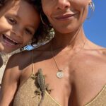 Thandiwe Newton Instagram - My kid came across this cute blue bottom lizard (I love lizards) on the sand. We picked it up to find a safe spot for it - it wound up spending a full hour on my chest! We had to take it (‘Brooch’) off to release it into some brush. I loved it for a while. But then let it go. Of course :) I hope you’re having as peaceful a Sunday as is possible for you. Tomorrow I plan to try and help make Sundays a bit better for people who can’t make it happen for themselves. And of course, I mean every day. Trying. Thank you all, everyone, for trying. Xxxxx