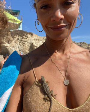 Thandiwe Newton Instagram - My kid came across this cute blue bottom lizard (I love lizards) on the sand. We picked it up to find a safe spot for it - it wound up spending a full hour on my chest! 

We had to take it (‘Brooch’) off to release it into some brush. I loved it for a while. But then let it go. Of course :) 

I hope you’re having as peaceful a Sunday as is possible for you. 

Tomorrow I plan to try and help make Sundays a bit better for people who can’t make it happen for themselves. 

And of course, I mean every day. 

Trying.

Thank you all, everyone, for trying. 

Xxxxx