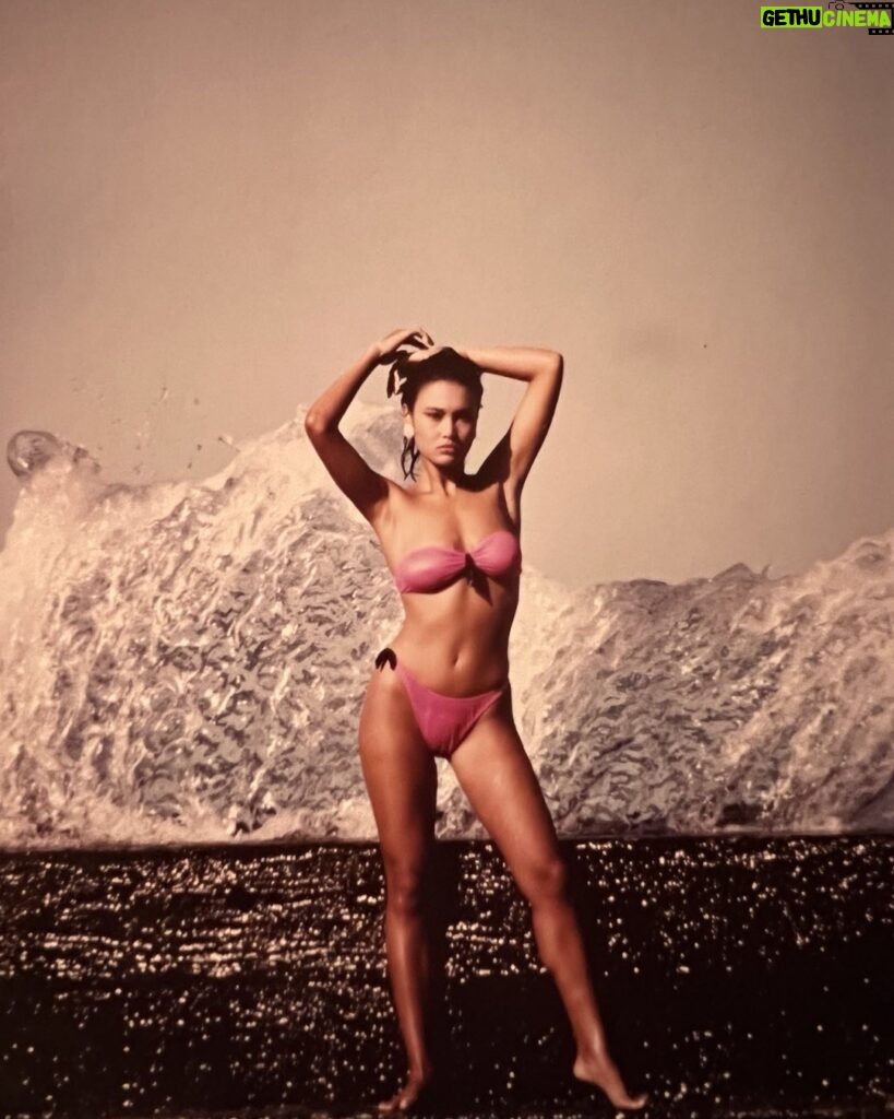 Tia Carrere Instagram - Happy Aloha Friday! I know standing on a Waikiki sea wall with my back turned to the ocean seems dangerous, but really the most dangerous thing about this photo is that I’m just 17 years old!! 🤣 #flashbackfriday #model #modelling