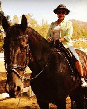 Tracey E. Bregman Instagram - We lost the soul of my Ranch this morning. Standing Ovation or Ovi, as he was known as, passed away with me by his side. This is the hard part for loving these beautiful souls so fiercely. We had 10 incredible years together and my boys and my whole family loved him deeply. Ovi, I hope you are doing canter pirouettes in heaven with Buddha by your side. #standingovation #freisian #love 💔❤️