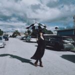 Tristin Mays Instagram - It was drizzling shortly before this trust me. My mum snapped this snazzy photo 🖤