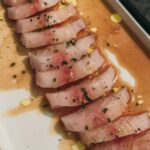 Valentine Thomas Instagram - The photos are too pretty not to post hehe. It’s always so much fun to cook with someone who shares the same passion (aka obsession) for food. @angelmia79 and I made: Photo 2: African pompano, bacon cold smoked by @joserlfreedive Photo 3: Kampachi, Sumo orange ponzu, orange oil Photo 4: Bonito sashimi, EVOO, Maldonado salt, chives Photo 5: King mackerel ragout bruschetta Photo 6: torched mackerel Photo 7: mackerel topped with rice brown vinegar shallot vinaigrette, harissa oil Photo 8: roasted snook head, miso-ponzu butter Photo 9: ma fav Italian buddy 🇮🇹 Photo 10: lobster pasta, Dyson air dried mullet bottarga 😂(thank you @efish_co for the roe) 📷 @ggerbasi All eaten by @laurensarasua 😂
