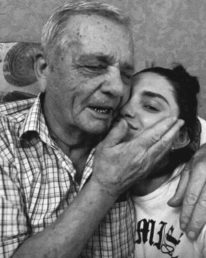 Valeriia Karaman Instagram - Today, I want to dedicate a post to my dearly beloved grandpa, who passed away on 17/12/2023. He was an extraordinary man with the heart of a lion. As the eldest son in a family of seven children, he endured many hardships throughout his life, yet I never once heard him complain.  As a child, he survived World War II. At 14, he lost his father and became the pillar of the family for his mother and younger siblings. From a young age, he taught me about world history and geography. He gave me my first nickname, "grasshopper," and until the last time I saw him, he would affectionately sing, "Look at this grasshopper, so cute with his knees bent backward." My grandpa walked me down the aisle at my first wedding, and I would cancel a job in Paris just to fly home for his 80th birthday.  The love story between my grandpa and grandma was one for the ages; they spent nearly sixty years together, a testament to their enduring love and commitment. He was a one-woman man, and that woman was my grandma, his partner in every sense through life's journey. 
In the last three years, grandpa suffered from dementia, and in his final weeks, he was in a coma. I saw how tired he must have been, and even though I hoped for the best, I understood it was his time to rest. 
Last year, my grandparents moved from Kherson to my place in Kyiv, and I did my best to alleviate their suffering. During my last visit in Kyiv, I tried to stay as long as possible, even though I was terrified during the intense russian attacks in May. 
I am immensely grateful to my wonderful friends @oleksandrahhh, @old_nyc, and @igormakedon for caring for my grandparents especially I’m grateful to @old_nyc for taking my grandpa for a walk to do sports and visiting them as often as they could. 
Tomorrow, we will lay my grandpa to rest, but the memories of him will remain with me for as long as I live. 
Grandpa, you were always there for me, more of a father than anyone else could be, including my own fathers. 
I love you eternally, and a part of you will forever be with me.
