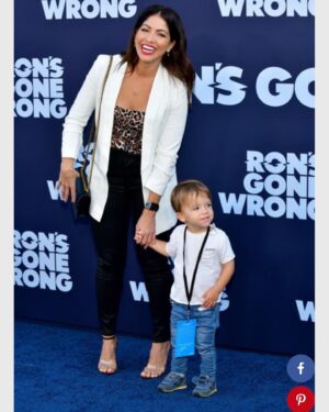 Valery M. Ortiz Instagram - I know it’s blurry but it captures my whole heart in that moment! Taking Dorian to his first movie in a theatre and ALSO having him escort me down the carpet was so freakin’ special and pretty hilarious! He was waving to the photogs and hamming it up! It was just so dang funny I kept laughing all down the carpet! He was THE best lil date ever! 😍 
Cherry on top?! We got to hear @kyliecantrall do her thing in the movie!! Agh!! So proud of you bella!
.
Swipe LEFT to:
1) Learn how to do a proper red carpet smolder from Dorian 😂😍👏🏽
2) Also see a pic of Nathan, Max and I on the BLUE carpet!
3) BTS selfie w/ Max
4) See Dorian, Ben and I rocking our ‘Ron’s Gone Wrong’ beanie swag! 
5) Watching Dorian enjoy his first movie theatre experience. My heart ya’ll!!
.
.
.
History: I’ve known Dorian’s dad @benmarcsilverman since I was in 8th grade. I was a grooms woman at his wedding. Having this experience with his son is like 😩 because you know - family. 🙏🏽
Shoutout to Mama @anasiya7 who was at home nursing Dorians 2wk old lil sis!! 😍