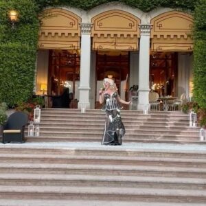 Vanessa van Cartier Instagram - In the enchanting Villa Feltrinelli Gragnano,
Where time seems to slow and dreams come alive,
I am filled with gratitude as I take the stage,
To perform for friends who make my heart thrive.

The grandeur of this place, a sight to behold,
With its elegant architecture and picturesque views,
The beauty of the surroundings, a feast for the eyes,
Enhancing the experience, igniting inspiration anew.

As the melodies flow, carried by the gentle breeze,
The music weaves its spell, touching every soul,
The audience, a tapestry of smiles and applause,
Their presence, a gift that makes me whole.

In this sacred space, love and music intertwine,
Creating a symphony of emotions, pure and true,
The connection between us, a bond that's divine,
As we share this moment, our spirits renew.

Villa Feltrinelli Gragnano, a haven of joy,
Where dreams are realized and memories are made,
I am blessed to have performed in this magical place,
For friends that I love, forever in my heart, they'll stay.
Happy Birthday dear Stephen❤️ ly both!

Wig @wigmayson 
Dress @dglamour 

#drag #dragqueen #dragqueens #gardalake #italia #fashioninsta #birthdaypresent #love #classy #villafeltrinelli #lagodigarda