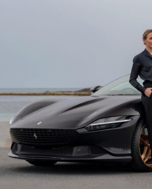 Victoria Pendleton Instagram - I am very fortunate to get invited to do some extraordinary things….like driving the luxurious Ferrari Roma whilst enjoying the beautiful countryside and twisting coastal roads of Northern Ireland. Thank you @ferrariuk 
🖤🖤🖤
#Ferrari #Roma #sportscar #luxury #blackandgold #pressday 📸 @maxearey