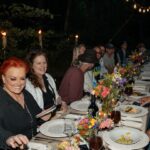 Wynonna Judd Instagram - Part 2 ✌🏼 of last week’s birthday festivities! Everyone who knows me, knows that I am not a fan of surprises!!! I knew that something was planned for my actual birthday, but wasn’t sure what. I was told to drive to the gazebo (where Cactus and I got married) at 6:30pm. We arrive, expecting a group of people to yell “surprise!” Much to my surprise, we find nothing besides a bottle of champagne and two glasses. 🥂 A peaceful, quiet moment with my sweetheart in the midst of a very busy week. We’re then instructed to drive to one of our favorite spots on the farm, a spot we’ve recently named “Peaceful Creek.” My dear family and chosen family have gathered for the most beautiful dinner IN the creek, and even flew in one of my favorite chefs @chefbobbymarcotte to cook for us. Thank you to everyone who understands my heart’s desire! Family, friends, and fellowship at my favorite place on earth…HOME. 💛 📷: @hayleyshoots
