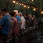 Wynonna Judd Instagram - Part 2 ✌🏼 of last week’s birthday festivities! Everyone who knows me, knows that I am not a fan of surprises!!! I knew that something was planned for my actual birthday, but wasn’t sure what. I was told to drive to the gazebo (where Cactus and I got married) at 6:30pm. We arrive, expecting a group of people to yell “surprise!” Much to my surprise, we find nothing besides a bottle of champagne and two glasses. 🥂 A peaceful, quiet moment with my sweetheart in the midst of a very busy week. We’re then instructed to drive to one of our favorite spots on the farm, a spot we’ve recently named “Peaceful Creek.” My dear family and chosen family have gathered for the most beautiful dinner IN the creek, and even flew in one of my favorite chefs @chefbobbymarcotte to cook for us. Thank you to everyone who understands my heart’s desire! Family, friends, and fellowship at my favorite place on earth…HOME. 💛 📷: @hayleyshoots