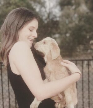 Xenia Goodwin Instagram - Caught mid kiss with the baby goat temporarily named 'chewie.' Pure joy, nothing can be bad with a baby goat in your arms!!! #babygoat #joy #farmlife #litfam @jacksynth