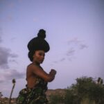 Yaya DaCosta Instagram - is MBUNDU. . The Mbundu, traditionally a matrilineal Bantu people, have lived in present-day Angola since the Middle Ages. We were once head of “The Ambundu Kingdom” called “Ngola” (meaning iron), from which the name “Angola” was derived. The most well-known Mbundu figure in history was the powerful ruler Queen Nzinga. There are many oral traditions passed down about her polyandry, as well as her advanced military and negotiation tactics that staved off Portuguese invaders and kept them under control through a relationship of trade (ivory, rubber, wax, and humans). The tradition of resistance permeated Angolan culture so much that, even under Portuguese rule by the 1800s, many Ambundu communities remained sovereign, until the last of them, was defeated by the Portuguese in 1917. The spirit of revolt stayed with many descendants of this tribe as well, which could be evidenced by the existence of “Quilombos” (a Kimbundu word meaning “war camp”) in Brazil (another previous Portuguese colony), where self-freed people overthrew their captors and set up self-sufficient, independent communities. . Channeled message: You have done much much fighting on your feet. It is time for buoyancy. For wading in the waters of the creation of the New World. There are those whose spears, guns, arrows and bombs must speak for them. There are those whose sharp tongues pierce the minds of the masses from stages larger than we could have ever dreamt possible. And still, there are those whose contributions come from a quieter place, but whose influence is no less effective. You, my dear, have been tasked with using the gifts you have access to. In that receptivity, that creativity, that reflection, that mysticism, that magic, that art, you serve in accordance with the Divine’s plan. You must do your work from there. We have been many kinds of warriors. Now, Warriors of Peace… This is your time. . . 📸: @thaisaquinophotography 💇🏾‍♀️: @chiomanvhair 🎵: Bonga, “Mona Ki Ngi Xica” (meaning “The Child I Leave Behind” in Kimbundu) . #AncestryDecolonized #BlackFuturism #IndigenousFuturism #BlackHistoryMonth #BlackHerstoryMonth #BlackFutureMonth