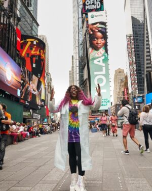 Yola Instagram - I can’t thank @spotify enough for the support they’ve shown for the release of Stand For Myself, look at this here billboard, in TIMES SQUARE no less! I was so fortunate to catch up with my friend & photographer @jross_smith to witness this together. Now @spotify are offering you guys a Fans First pre-sale for the tour dates we announced yesterday. If you have been listening on Spotify check your emails to see if you have the pre-sale code. Happy ticket buying! 
📷 1 & the billboard image @jross_smith 
2 of @jross_smith celebrating our collective majesty by @direimage