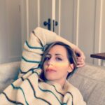 Zibby Allen Instagram - Photo/Video dump of moments in my album that I have zero memory of but am enjoying wondering about these various states I was in. (Time is weird dude.) 1 - The place we stay in Vancouver has a lot of beautiful stained glass which casts rainbows into the house. Guessing @adamjamesblair snapped this pic when I was chillin, no idea a rainbow was parked on my face. 2 - This vid definitely occurred in my trailer while filming #virginriverseason4 but I don’t remember this dance-y moment at all!? I do often play music and dance it out while waiting for my hair to set though. 😂🤦‍♀️ 🔊 🎵 #virginriverbts 3 - Forgot about this look from a photo shoot I did with @theportraitsessions Haha. I’m obsessed with my cute little Cactus pin from @wkndrsforlife (I might have also been covertly auditioning for a #KevinCostner project here 🤠) 4 - One of many moments where I’m laying on a table at a beauty clinic wondering what the hell Im doing to myself, probs 😅 5 - Husband must have taken this 📸. Kona is my Chill and Nap Trainer. It appears this was a successful session. #dontforgettonap
