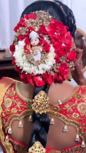 vj Santhiya Instagram - Accessorised these beautiful red carnation with golden baby breath flowers 🌺🌺along with lord murugar idol as per her request for our dear @aval_santhiya from @lsquarebridalflowerdesigner for morning mugurtham hairstyle..

makeover @mystylemakeover_studio 
Hair do @dillu_hairstyles_786 
.
DM for bridal booking  91 9940402448