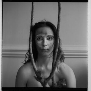 Abby Corrigan Instagram - self portrait, with face paint

#ilfordhp5 #mediumformat #analogue #hasselblad #filmphotography