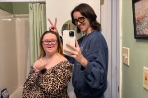 Abby Corrigan Instagram - World Down syndrome day was yesterday - but someone like Emma should be and will be celebrated everyday. In honor of Emma, Go hug someone for at least 2 minutes, wear a cape, dye your hair, listen to some BTS, or, perchance, have many, many, chicken nuggets. 

you’re the other half of my heart, em ❤️ 

@e.corri