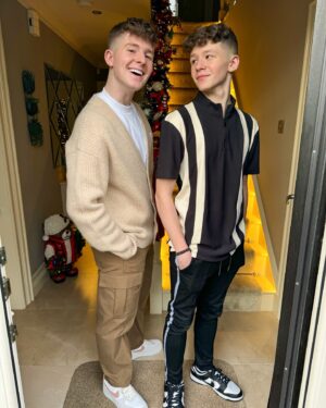 Adam Beales Instagram - Merry Christmas from me and my (big) little brother!!🎄❤️