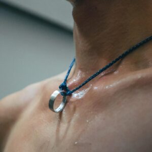Adam Ondra Instagram - I have been wearing bead necklaces for years, since I was about 6, and I truly believe they bring me energy 💪 Possibly, my long neck made me feel vulnerable, and the bead necklace covered it. Since I am married to @ivaondra, a wedding ring on a climbing rope works even better👌

📸 @pet.phot / Pavel Blažek

#climbing #rockclimbing #mammut
@mammut