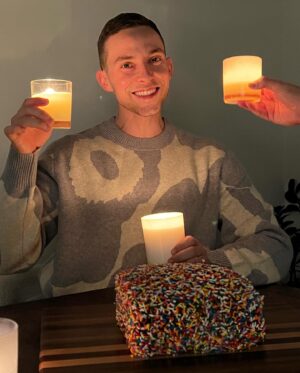 Adam Rippon Instagram - Thank you for all the birthday wishes 🥹🥹 So grateful for all the experiences of 33 and excited for all the greats things to come at 34❤️❤️❤️ 11/11/23 🎂 - also I made this cake and I’m very proud of it and all its sprinkles. I didn’t want to ruin it with birthday candles so I just created a birthday séance with bath and body works candles instead.