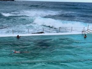 Adam Walker Instagram - MAN vs WAVES 🌊 
Different view….
Check these waves out!!!! Great pool @icebergsclub Bondi, Sydney 🇦🇺

An example that with good balance & form waves roll over the top of you. Now you just need your learn it. Click SHOP on this video & subscribe with easy to understand instruction on how to swim this way!!! For pool, open water swimming, triathlon & Ironman 
#swimming #swimfaster #swimbetter #oceanwalkertechnique #adamoceanwalker