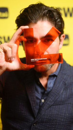 Adrian Grenier Instagram - Stepped up to accept an award, but the real heroes are the team behind @lonelywhale. 🌱

Thanks to our team’s hard work with Tom Ford on the Plastic Innovation Accelerator at SXSW, we’re turning sparks into flames in the fight against plastic. 

#EcoWin #BeatPlasticPollution #InnovationForEarth