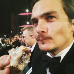 Aimee Mullins Instagram - Approved! @rupertfriend likes his PB&J. I, on the other hand, can't fit one more thing into this dress. #1950s #Emmys #corseting