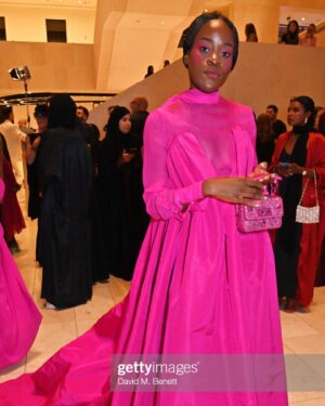 Aindrea Emelife Instagram - What's in the colour pink? When I think of pink I think of Venetian red mixed with St John's White, the lush raucous frivolity of Rococo, the eyeshadow lid of Warhol's Marilyn or neon flashes of Dan Flavin. Yesterday, pink for me only means Valentino. So excited to be invited to embrace the brands signature colour in honour of their exhibition Forever Valentino. 

Who said art historians shouldn't wear pink? 🎀 

@maisonvalentino