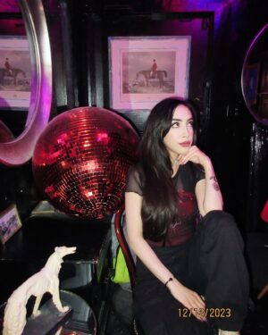 Ainsley Bailey Instagram - one of my favorite things about doing comedy is getting to hang out in green rooms lit like laser tag arenas 👾🪩