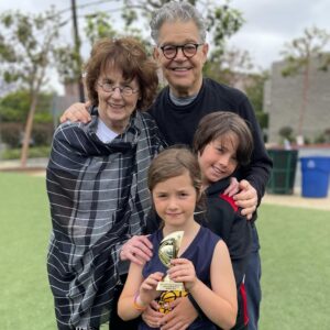 Al Franken Instagram - Grandma and me with Joe and Avery celebrate her team’s undefeated basketball season.  (They tied the other undefeated team! )