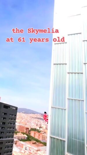 Alain Robert Instagram - Although climbing freesolo  tge skymelia in Barcelona is  not really a performance , aging is definitely  a countdown  and climbing  freesolo  those tall buildings  or cliffs is interogting  our societies as at the same time inspiring  a lot of people  but Also frightening  plenty  of them whom are playing by the book all along there lives as they are not use to it to question the establishments  as they can only feel at ease amongst the herds of our societies . they are the one condemning a potential  fall but they are ignoring  the fact that on the average  every single day 5k people  are dying in the world victim of a car accident  or a scooter . Accident  whom are nowdays very often linked to our smartphones  equipped from GPS that most of the drivers are manipulating whilst  driving . 
#climbing #freesolo #challenge #adventure #mindset #climbinginspiration