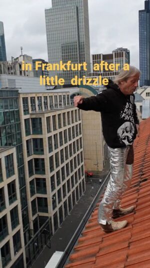 Alain Robert Instagram - a bit surprised  by that little slip all of the sudden  as the roof was still humid and slippery  from an an early drizzle and im smiling I got lucky as I get stopped  by the gutter. 
#climbing #challenge #adventure #mindset #stunt #resilience #masteringfear #climbinginspration