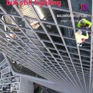 Alain Robert Instagram - Climbing  freesolo  the 190m Totalenergies building in la defense in Nov 2023 on a cold and very windy day as been a real struggle  towards the top to the point that I have lost my balance twice as I was negotiating  the last 20 meters but also badly affected  by the loss of one of the tape that was protecting  my fingers . 
#climbing #freesolo #challenge #adventure #reslience #masteringfear #climbinginspiration