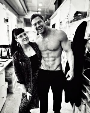 Alan Ritchson Instagram - Meet @katvonpire … she’s the one that makes all those big scary tattoos go bye bye when I have to film. 

This is us yesterday after she dipped me in a vat of acid to burn them off. I always say it hurts so bad, but she says it’s the only way. She travels with me to each project so she can keep zapping that evil ink away. It’s her favorite thing to do in life, so she tells me! I know she loves her job because she smiles a lot when I tell her I’m getting another. She also likes corners. She tells me she curls up and rocks herself in them all the time as soon as I leave. Especially right after I tell her I’m getting a new tattoo which is weird. 

Oh and guess what!? I’m getting another tattoo this weekend! A big one! When do you think we should tell @katvonpire ??